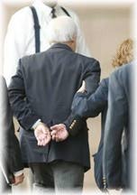 Ken Lay of Enron surrenders on a 53 count indictment