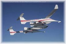 SpaceShipOne rides under the belly of White Knight to high altitude.
