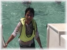 Beh climbs ladder back into the boat