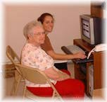 Nina  with Sonya setting up her computer  2005